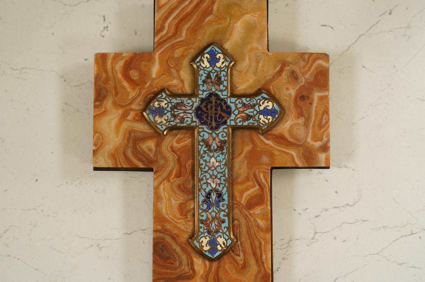 A champlevé enamel, onyx and brass Holy water stoop in the form of a cross, early 20th century, 23.5cm high. Condition - fair to good